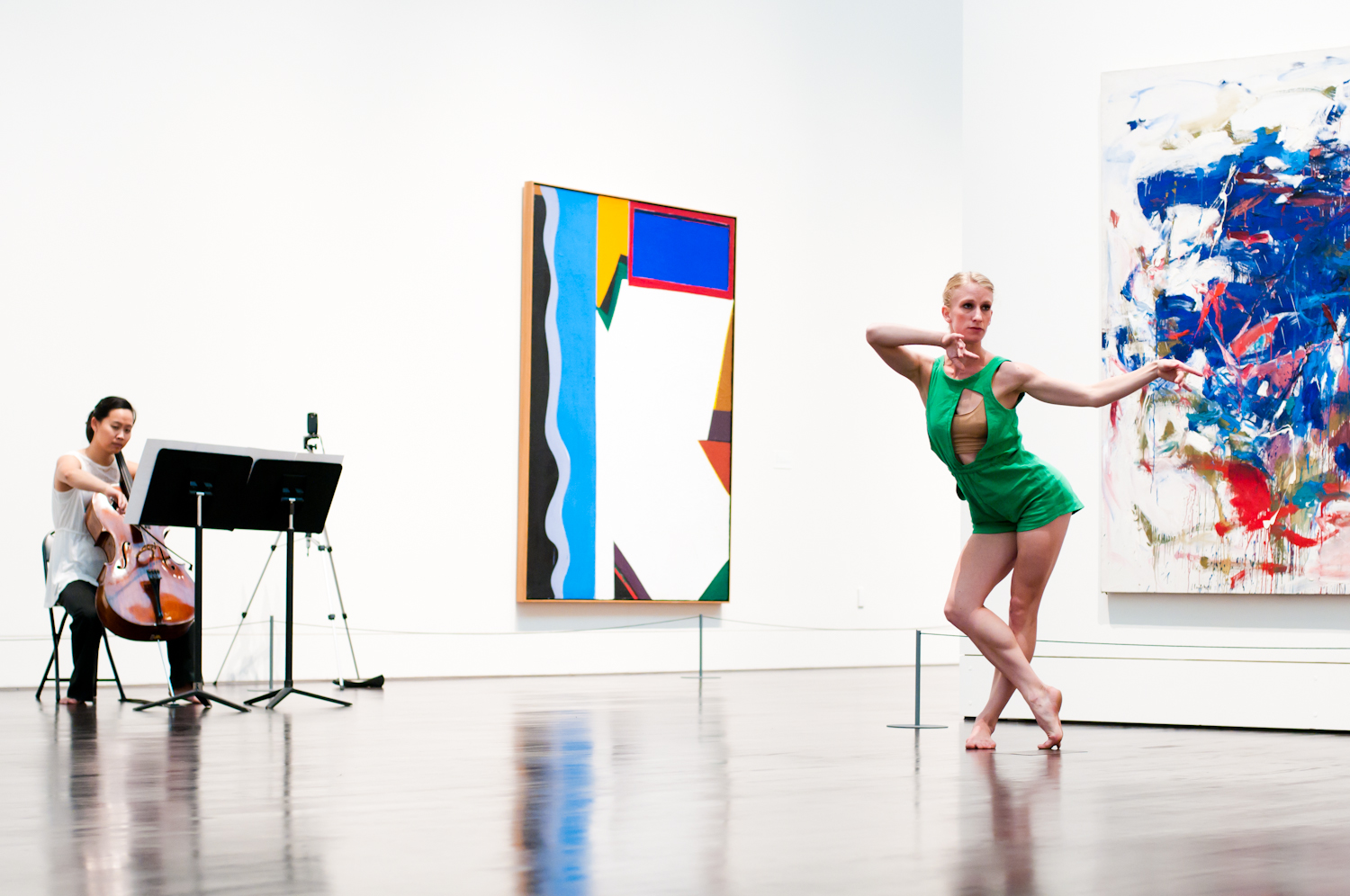 A dancer and cellist perform in the Blanton Museum of Art galleries