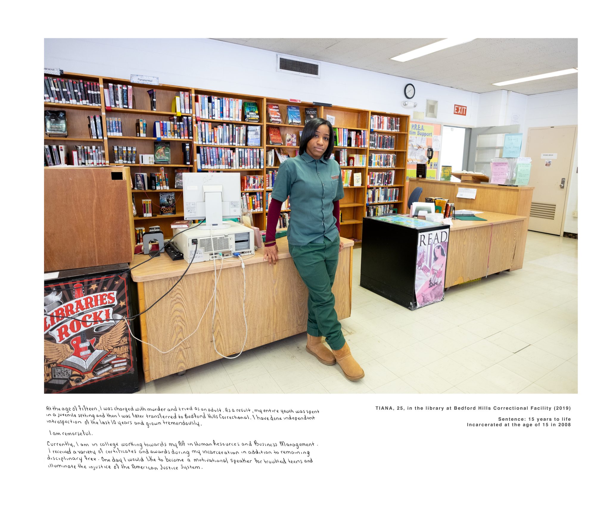 A Black woman standing in the library of a correctional facility