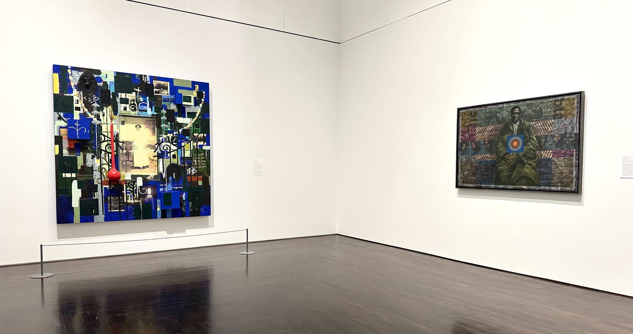 Two large works of art in a gallery
