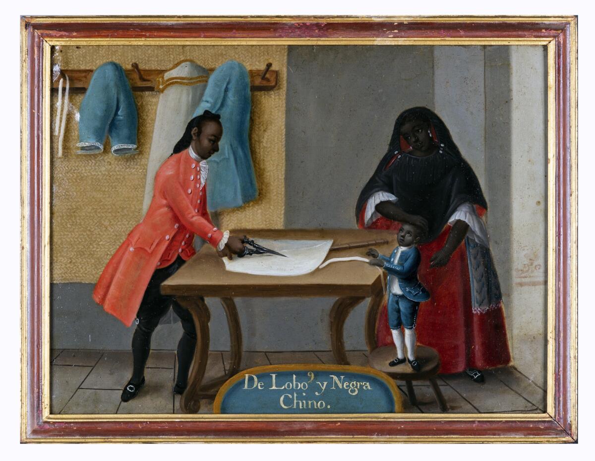A black tailor attired in red suit cuts a white fabric while observed by a woman wearing a laced black head-cover and a child clad in a white shirt and blue jacket and breeches.