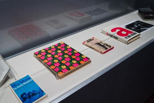 Printed books in a display case