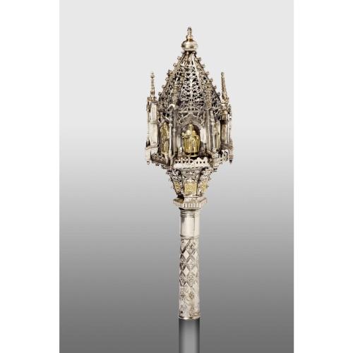 An ornate silver object in the Gothic style 